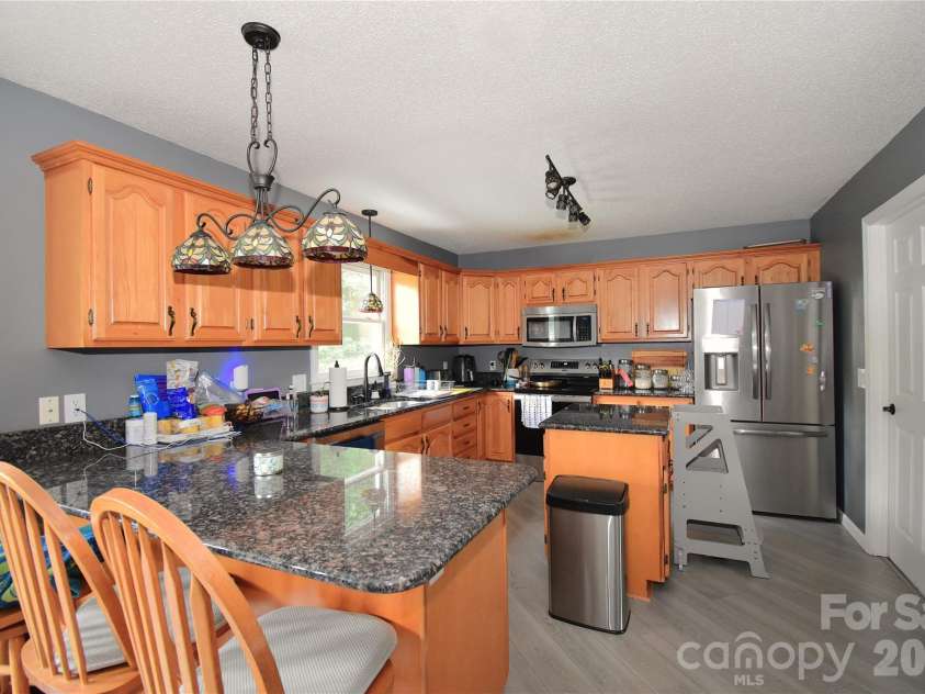 36 Cardinal Lane, Candler, NC 28715.  MLS# CAR4414046, YatesRealty ID 44055. 