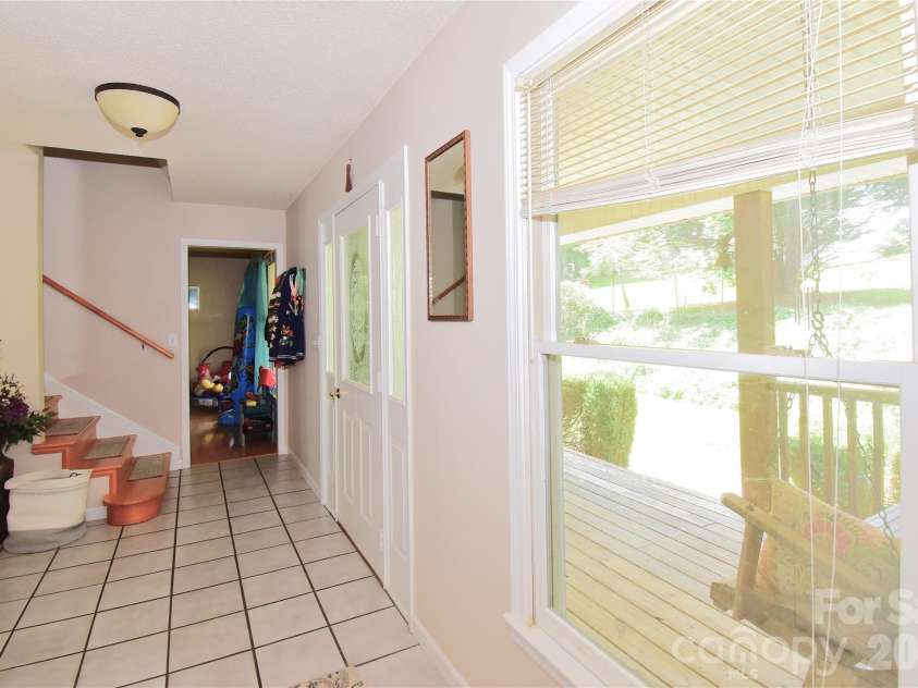 36 Cardinal Lane, Candler, NC 28715.  MLS# CAR4414046, YatesRealty ID 44055. 
