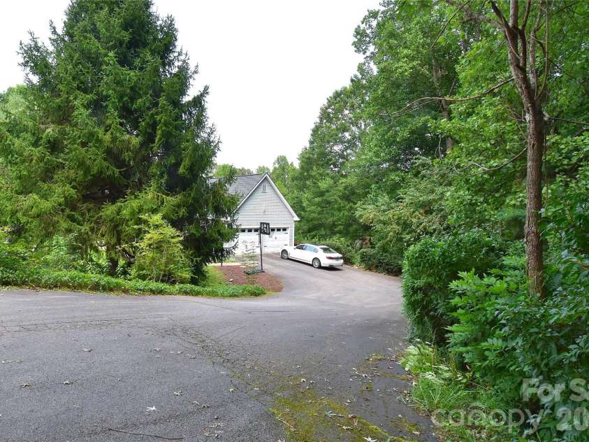36 Cardinal Lane, Candler, NC 28715.  MLS# CAR4414046, YatesRealty ID 44055. 