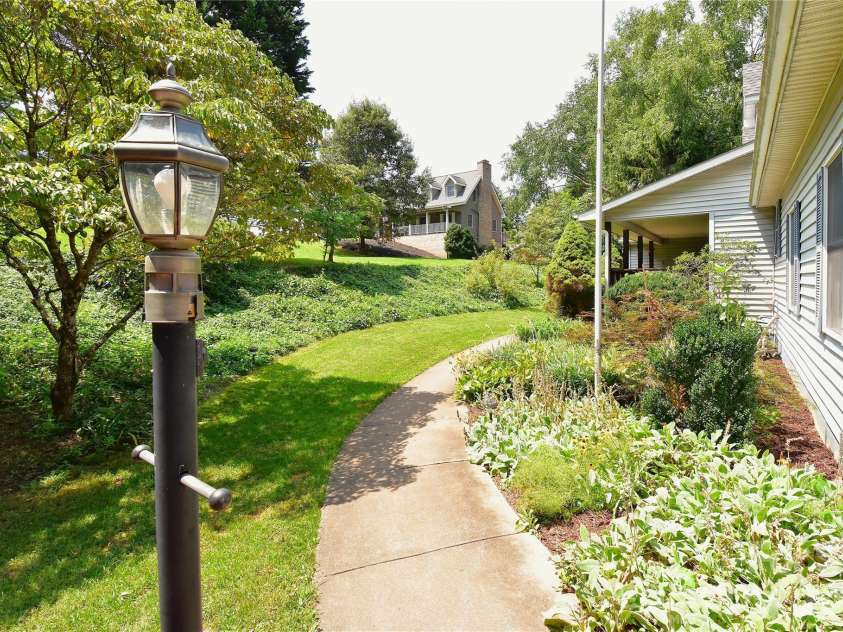 36 Cardinal Lane, Candler, NC 28715.  MLS# CAR4414046, YatesRealty ID 44055. 