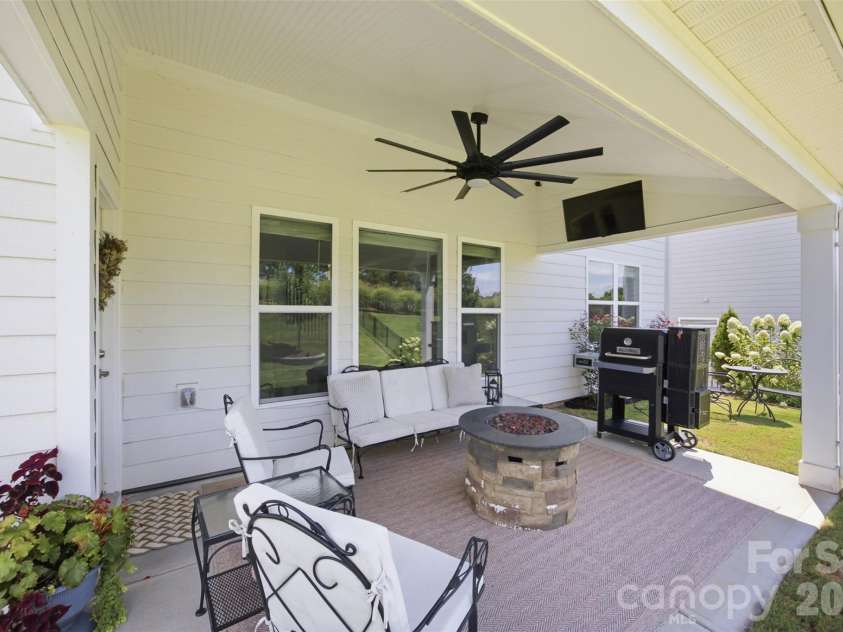 7025 Kingfisher Way, Belmont, NC 28012.  MLS# CAR4412650, YatesRealty ID 44056. Covered patio.