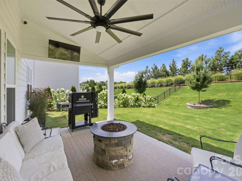 7025 Kingfisher Way, Belmont, NC 28012.  MLS# CAR4412650, YatesRealty ID 44056. Covered patio.