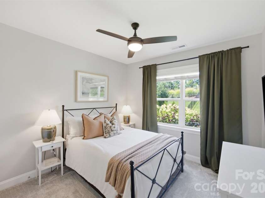 7025 Kingfisher Way, Belmont, NC 28012.  MLS# CAR4412650, YatesRealty ID 44056. Main level guest room.