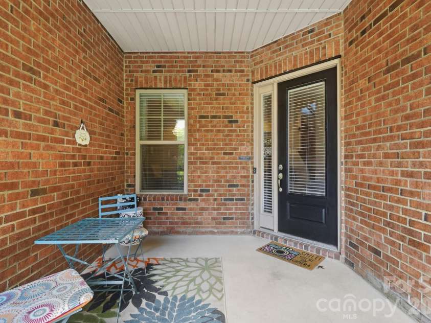 12726 Rusty Blackbird Way, Charlotte, NC 28278.  MLS# CAR4409710, YatesRealty ID 44064. Covered Patio-Front Door