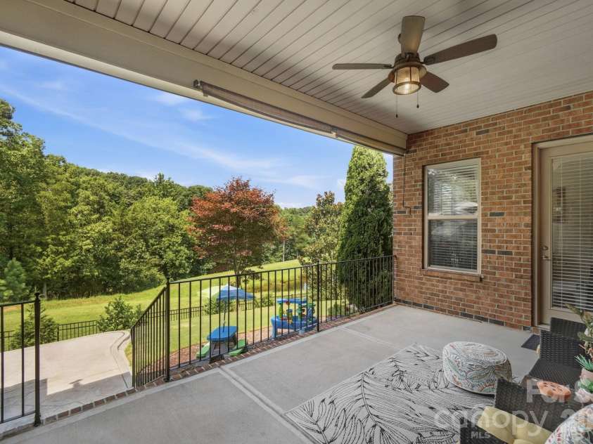 12726 Rusty Blackbird Way, Charlotte, NC 28278.  MLS# CAR4409710, YatesRealty ID 44064. Covered Porch in the Back