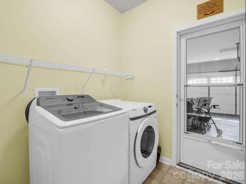 93 Foxtail Court, Hendersonville, NC 28792.  MLS# CAR4414198, YatesRealty ID 44074. Laundry Room
