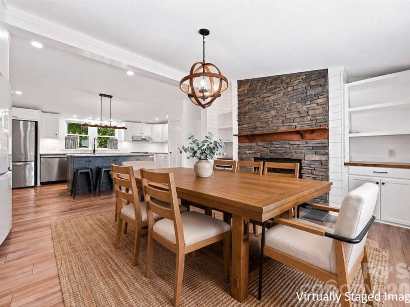 2587 Vision Drive, Catawba, NC 28609.  MLS# CAR4414475, YatesRealty ID 44079. Dining area with fireplace and walk-in pantry
