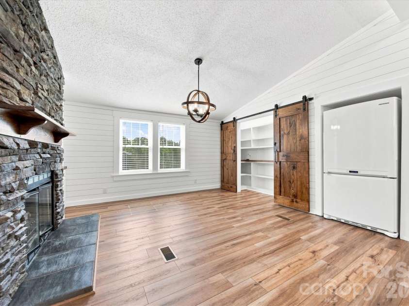 2587 Vision Drive, Catawba, NC 28609.  MLS# CAR4414475, YatesRealty ID 44079. Dining area with fireplace and walk-in pantry
