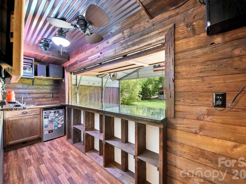 2587 Vision Drive, Catawba, NC 28609.  MLS# CAR4414475, YatesRealty ID 44079. Party shack bar from inside