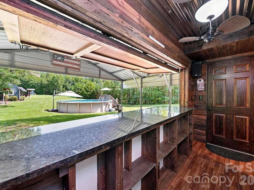 2587 Vision Drive, Catawba, NC 28609.  MLS# CAR4414475, YatesRealty ID 44079. Party shack bar from inside
