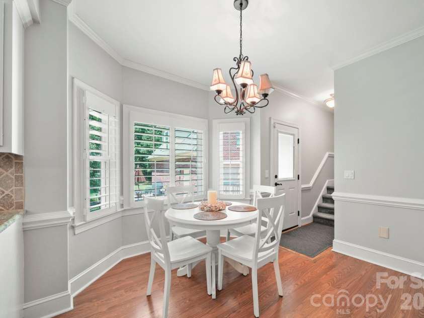 1256 Giverny Court, Concord, NC 28027.  MLS# CAR4411512, YatesRealty ID 44081. Bright and inviting breakfast nook with oversized windows!