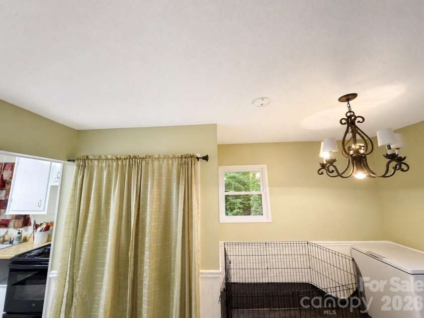6210 Hilltop Avenue, Kannapolis, NC 28081.  MLS# CAR4412982, YatesRealty ID 44083. Dining room/washer & dryer area