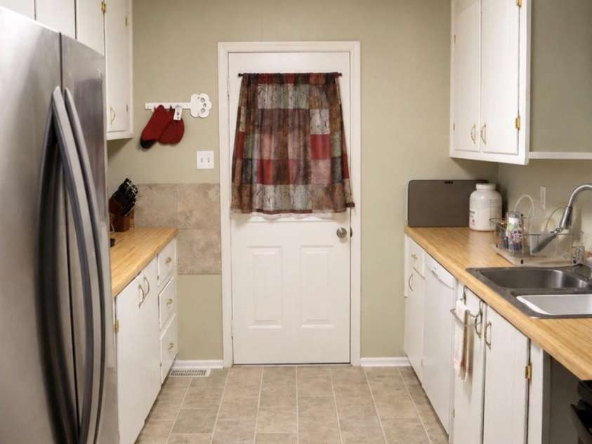 6210 Hilltop Avenue, Kannapolis, NC 28081.  MLS# CAR4412982, YatesRealty ID 44083. Kitchen view from dining area