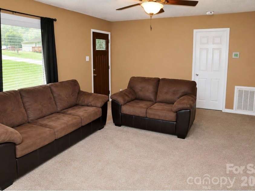 6210 Hilltop Avenue, Kannapolis, NC 28081.  MLS# CAR4412982, YatesRealty ID 44083. Living Room Area From Dining View
