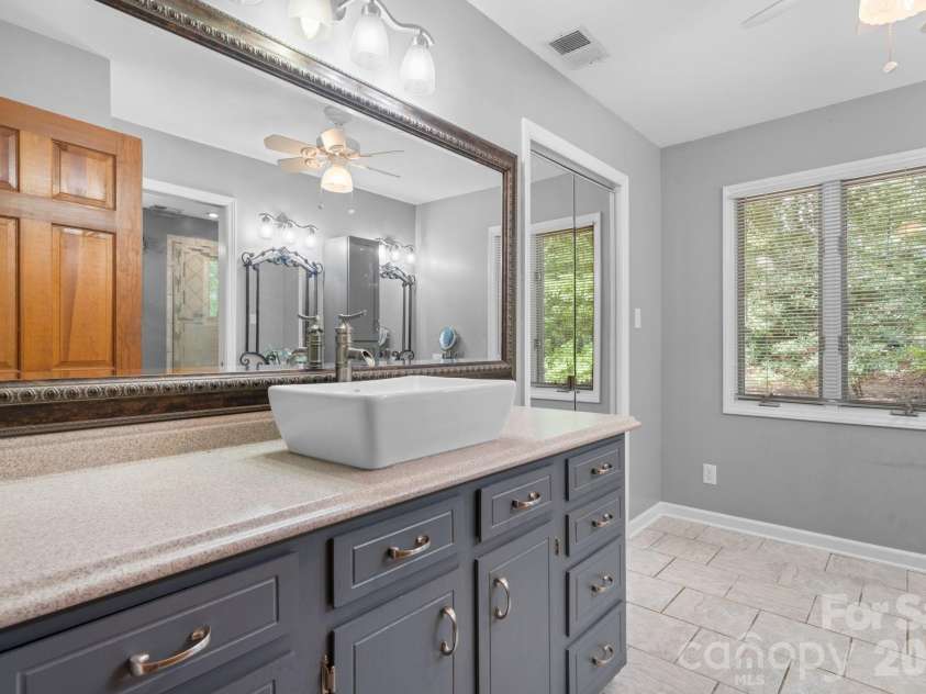 139 Windwood Lane, Troutman, NC 28166.  MLS# CAR4413560, YatesRealty ID 44085. Primary Bathroom
