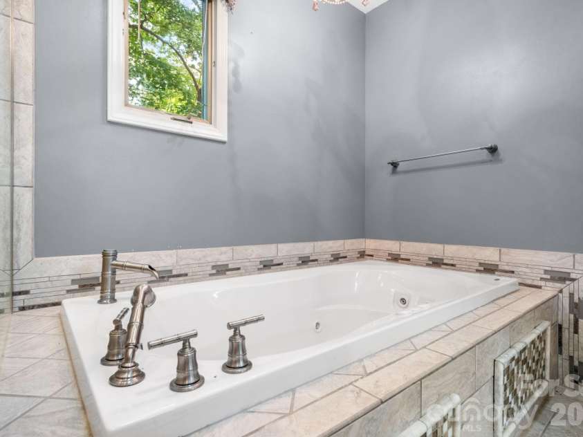 139 Windwood Lane, Troutman, NC 28166.  MLS# CAR4413560, YatesRealty ID 44085. Primary Bathroom