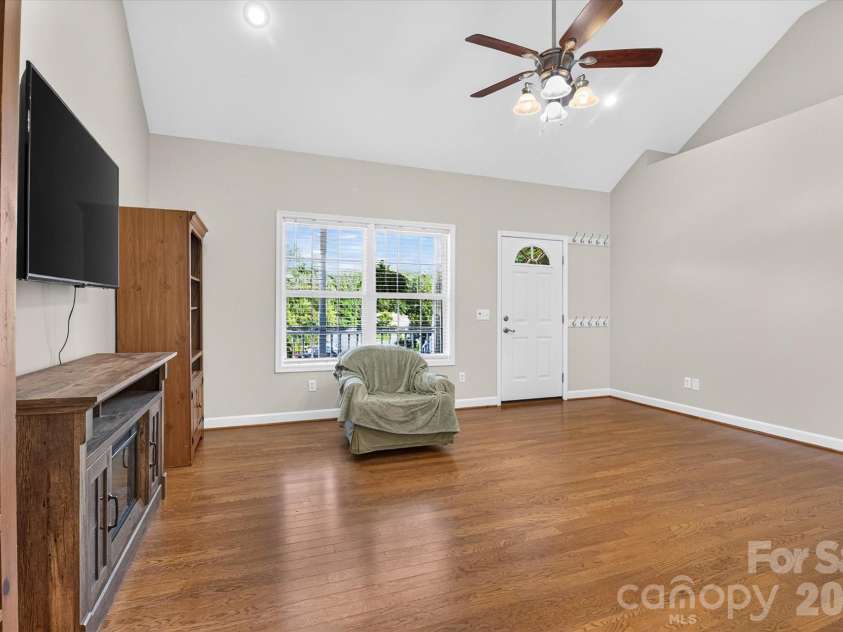 245 Eagle Creek Road, Clover, SC 29710.  MLS# CAR4414318, YatesRealty ID 44089. Great room with vaulted ceiling