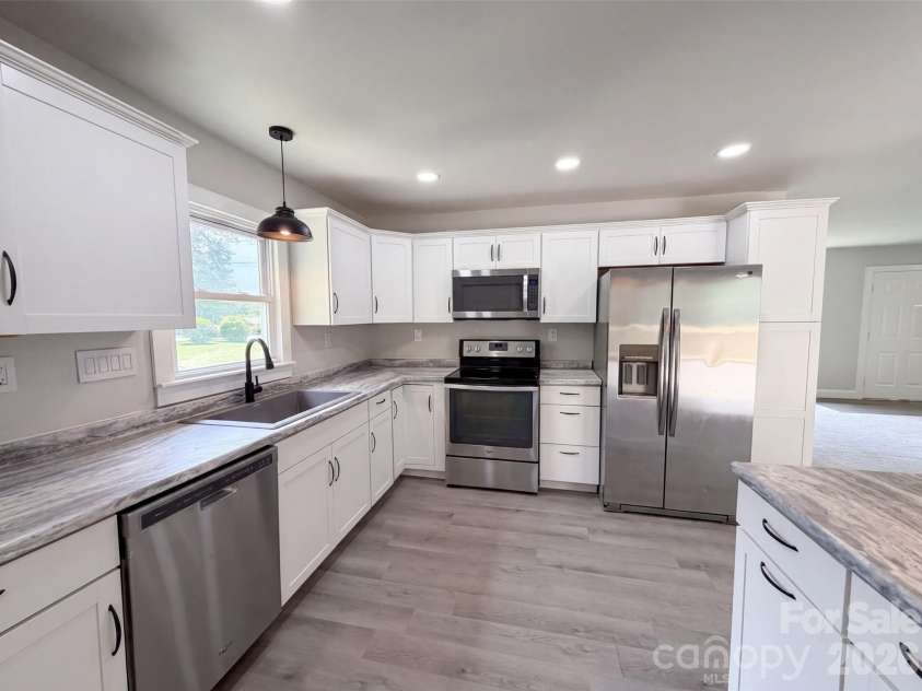 704 Morningside Drive, Mount Holly, NC 28120.  MLS# CAR4411857, YatesRealty ID 44091. 