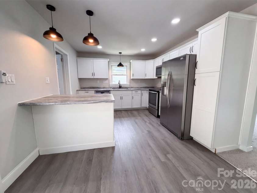 704 Morningside Drive, Mount Holly, NC 28120.  MLS# CAR4411857, YatesRealty ID 44091. 