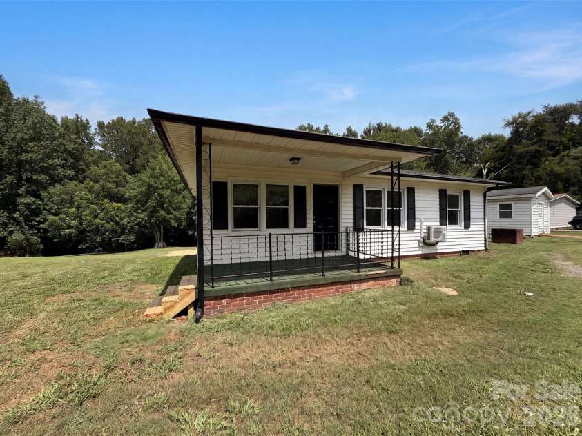 704 Morningside Drive, Mount Holly, NC 28120.  MLS# CAR4411857, YatesRealty ID 44091. 