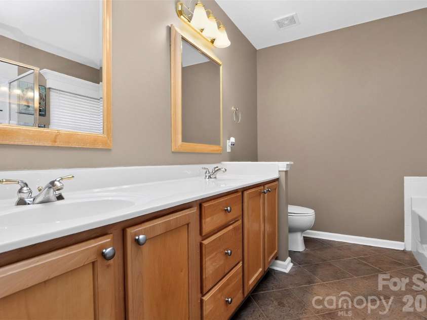 14642 Hawick Manor Lane, Pineville, NC 28134.  MLS# CAR4414256, YatesRealty ID 44101. Primary bathroom