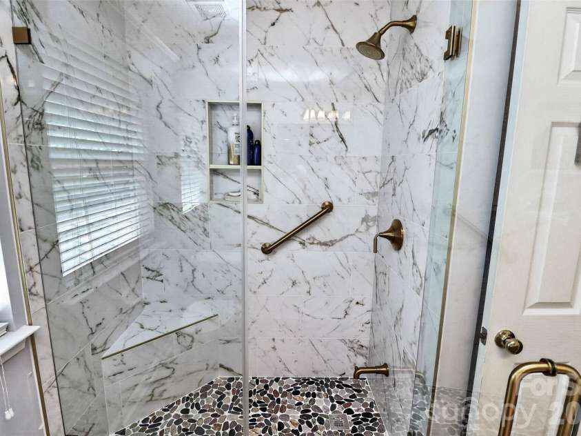 14642 Hawick Manor Lane, Pineville, NC 28134.  MLS# CAR4414256, YatesRealty ID 44101. Updated shower in bathroom 2