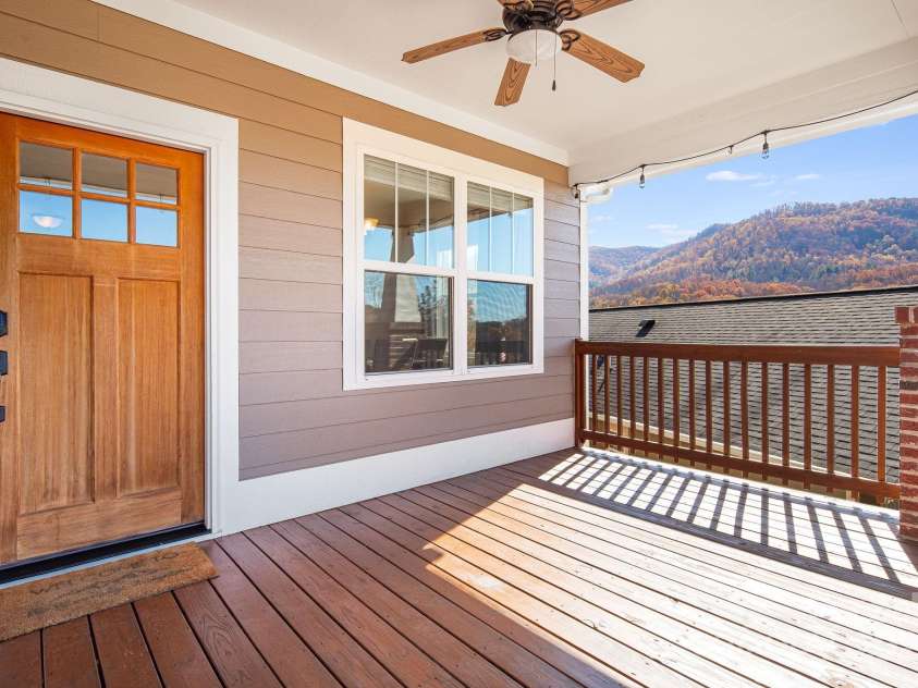 11 Byrdcliffe Lane, Asheville, NC 28805.  MLS# CAR4320731, YatesRealty ID 4411. Covered Front Porch with Mountain Views