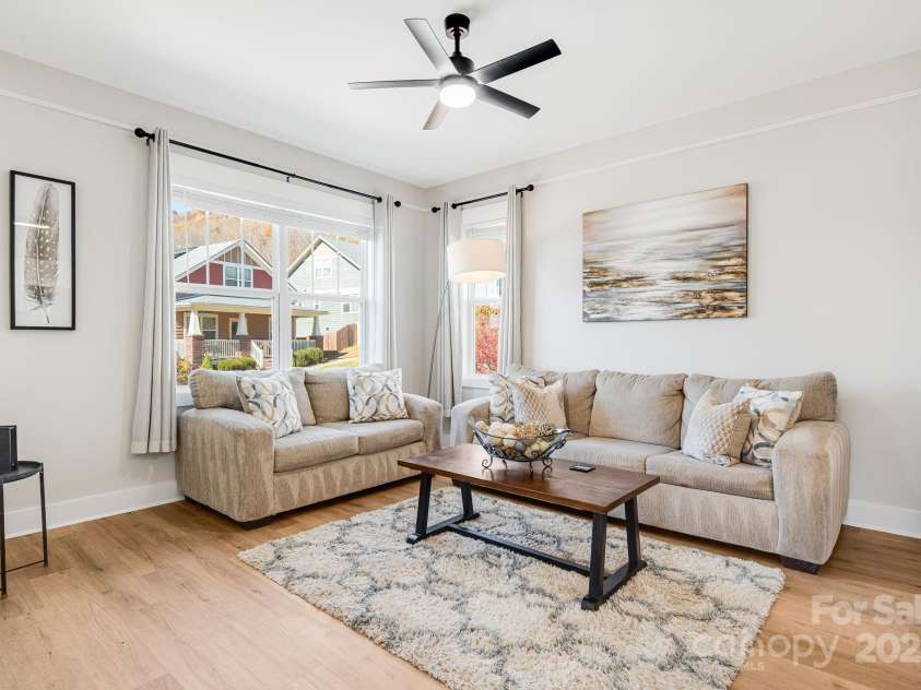 11 Byrdcliffe Lane, Asheville, NC 28805.  MLS# CAR4320731, YatesRealty ID 4411. Cozy Living Room