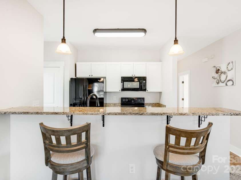 11 Byrdcliffe Lane, Asheville, NC 28805.  MLS# CAR4320731, YatesRealty ID 4411. Eat at Granite Kitchen Bar