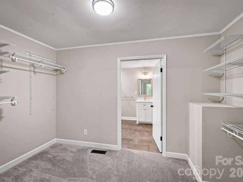 3517 Crestwood Drive, Morganton, NC 28655.  MLS# CAR4412373, YatesRealty ID 44111. Primary Suite Walk-in Closet
