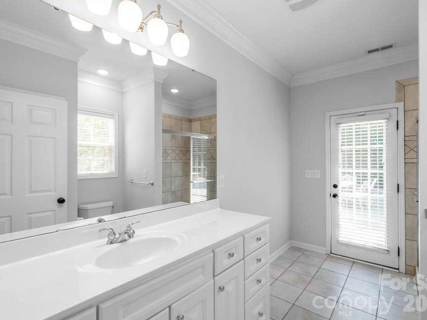 1107 Boulder Court, Waxhaw, NC 28173.  MLS# CAR4396049, YatesRealty ID 44112. Pool access from guest suite