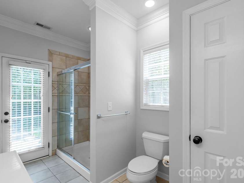1107 Boulder Court, Waxhaw, NC 28173.  MLS# CAR4396049, YatesRealty ID 44112. Sun room, virtually staged.