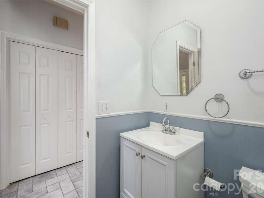 1043 Berea Church Road, Hendersonville, NC 28739.  MLS# CAR4413866, YatesRealty ID 44116. Half bath on main level