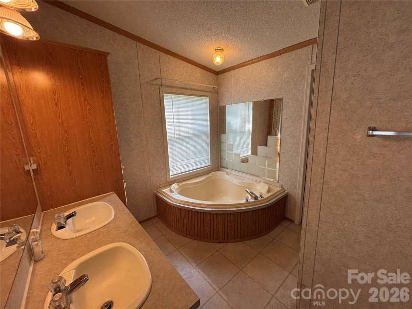 93 Ervin Lane, Hiddenite, NC 28636.  MLS# CAR4407263, YatesRealty ID 44122. 