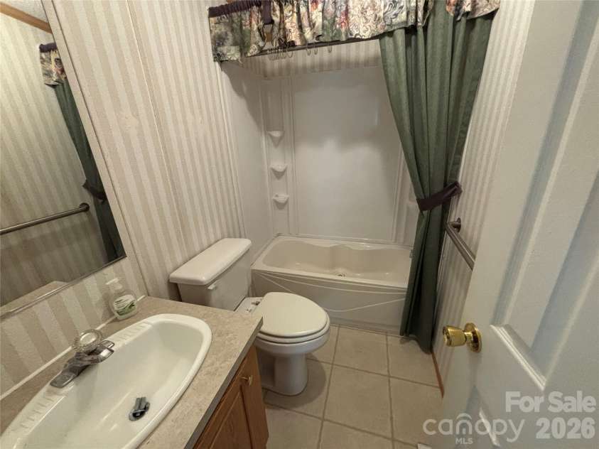 93 Ervin Lane, Hiddenite, NC 28636.  MLS# CAR4407263, YatesRealty ID 44122. 