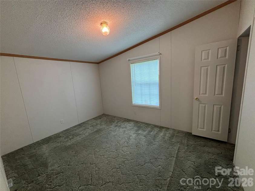 93 Ervin Lane, Hiddenite, NC 28636.  MLS# CAR4407263, YatesRealty ID 44122. 