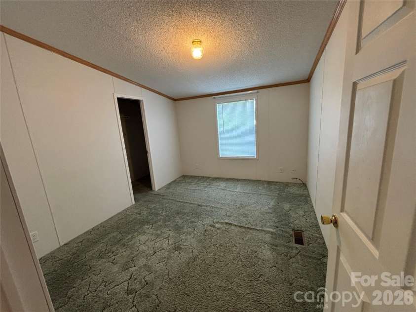 93 Ervin Lane, Hiddenite, NC 28636.  MLS# CAR4407263, YatesRealty ID 44122. 