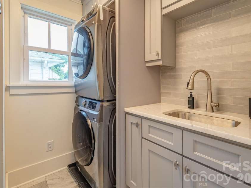 43 Walton Street, Asheville, NC 28801.  MLS# CAR4414367, YatesRealty ID 44124. Laundry room upper level