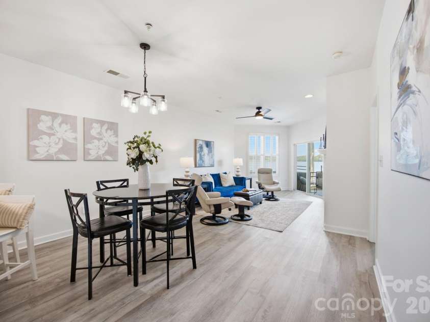 915 Northeast Drive, Davidson, NC 28036.  MLS# CAR4396238, YatesRealty ID 44126. Dining area with updated light