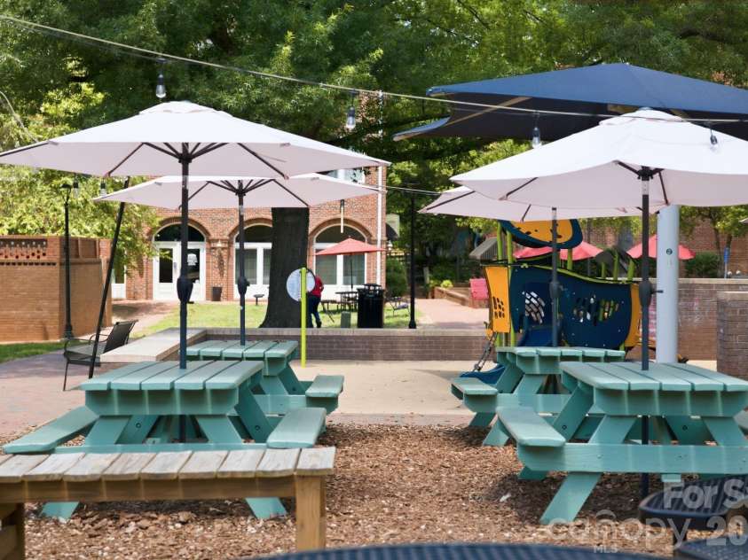 915 Northeast Drive, Davidson, NC 28036.  MLS# CAR4396238, YatesRealty ID 44126. Local hangout behind Summit Coffee