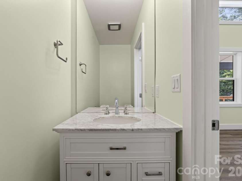 1008 Bell Mountain Road, Zirconia, NC 28790.  MLS# CAR4407045, YatesRealty ID 44128. Half bath