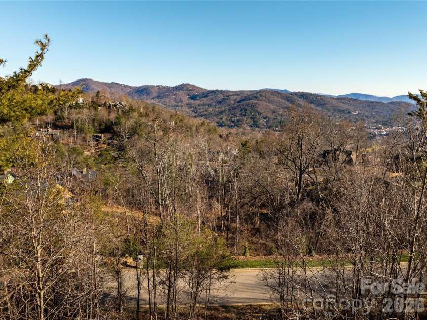 167 Summit Tower Circle, Asheville, NC 28804.  MLS# CAR4355240, YatesRealty ID 4414. View from lot looking South East