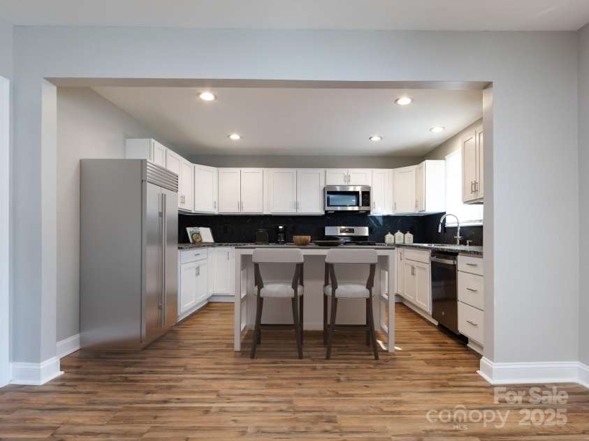 406 Harris Lane, Monroe, NC 28112.  MLS# CAR4202111, YatesRealty ID 4414. Virtually Staged. Virtual Island.