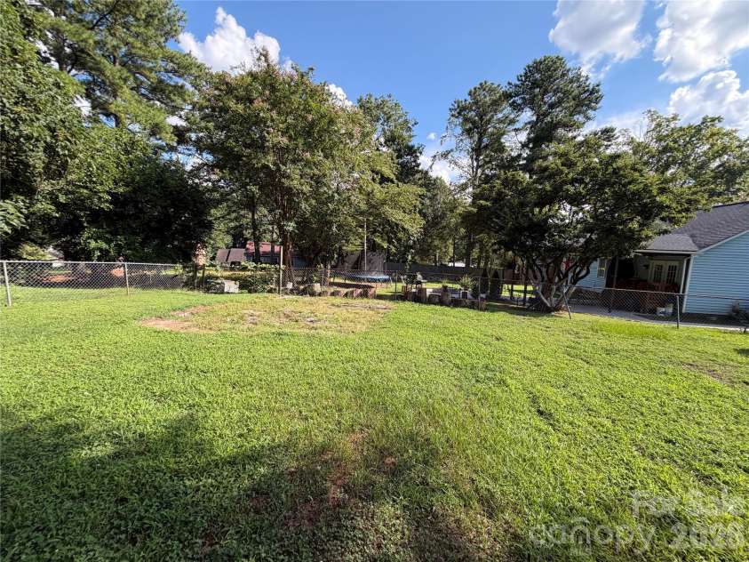 5124 Poplar Springs Drive, Charlotte, NC 28269.  MLS# CAR4414665, YatesRealty ID 44141. 