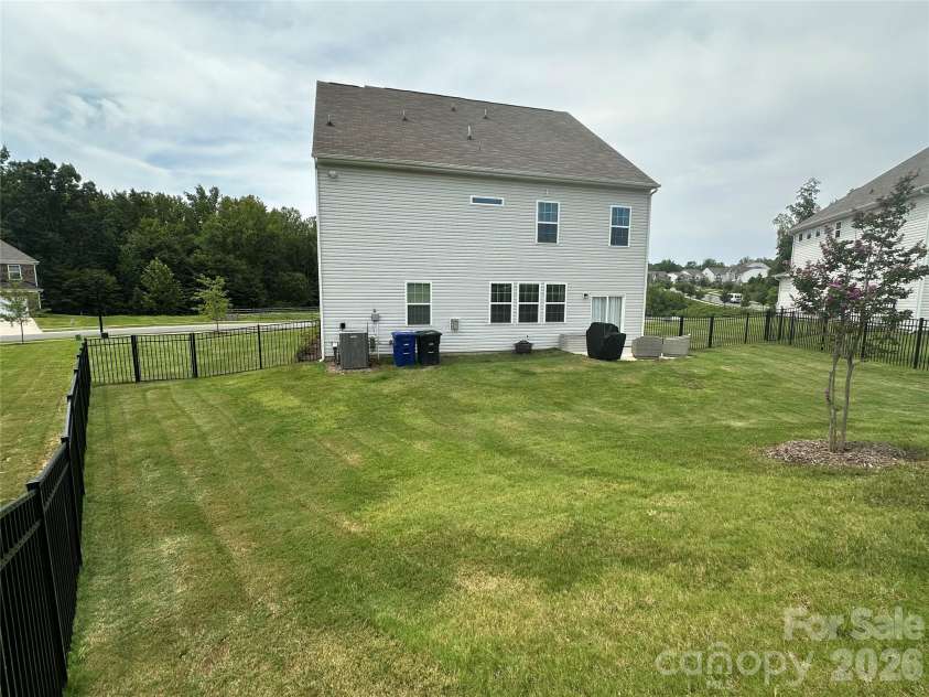 355 Kennerly Center Drive, Mooresville, NC 28115.  MLS# CAR4414239, YatesRealty ID 44149. Backyard