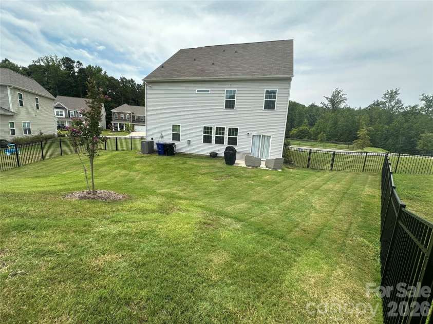 355 Kennerly Center Drive, Mooresville, NC 28115.  MLS# CAR4414239, YatesRealty ID 44149. Backyard