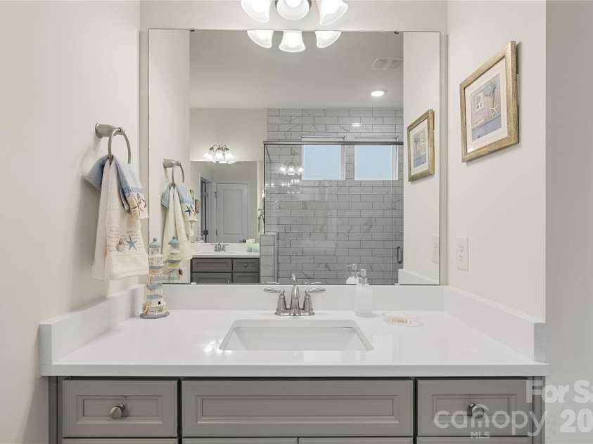 1200 Curling Creek Drive, Indian Trail, NC 28079.  MLS# CAR4414479, YatesRealty ID 44150. Two sink area in primary bathrrom