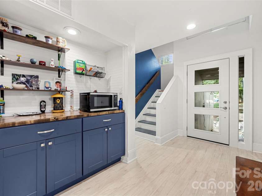 222 Riverview Terrace, Lake Wylie, SC 29710.  MLS# CAR4411366, YatesRealty ID 44151. Bar and storage opposite kitchen