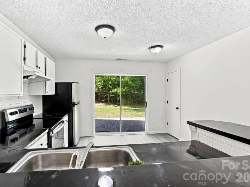 472 FIRST TURN Court, Concord, NC 28025.  MLS# CAR4414186, YatesRealty ID 44162. 