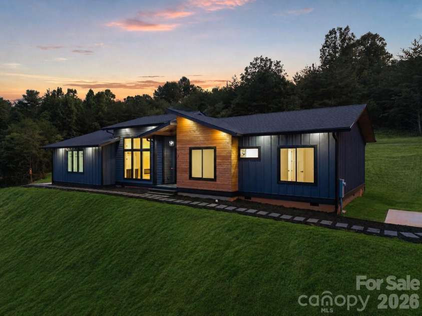 7 Spicebush Lane, Weaverville, NC 28787.  MLS# CAR4414124, YatesRealty ID 44164. Virtually enhanced grass